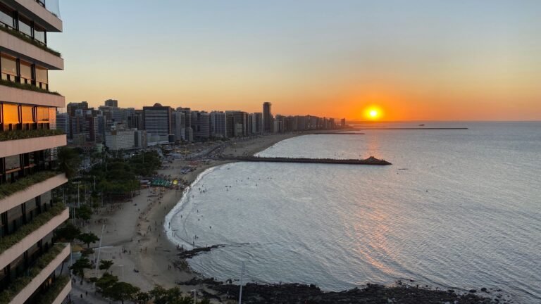 Sunset over the Fortaleza seafront in Ceará, Brazil, seen from a residential building